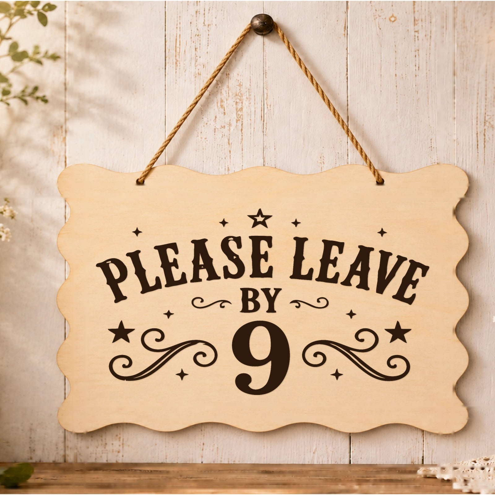 Please Leave by 9 wooden plaque displayed in a home setting