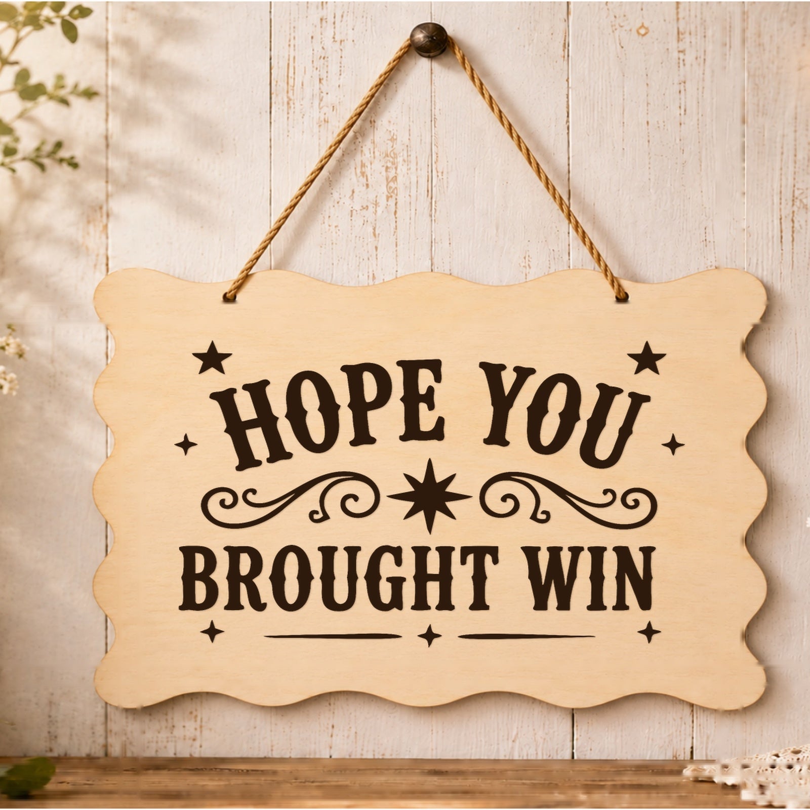 Hope You Brought Wine wooden plaque displayed in a home setting