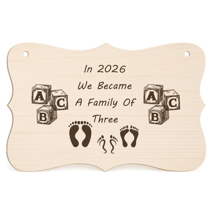 In 2026 We Became a Family of 3 wooden keepsake plaque on a white background