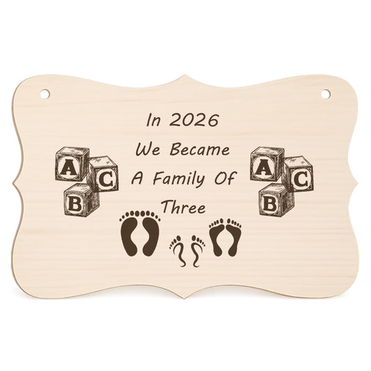 In 2026 We Became a Family of 3 wooden keepsake plaque on a white background