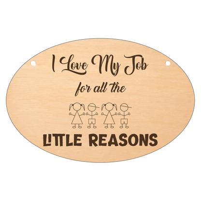 I Love My Job for the Little Reasons oval wooden plaque on a white background