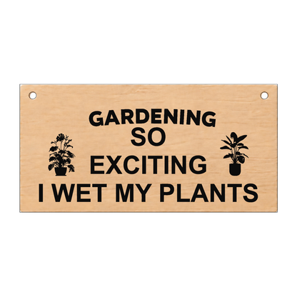 Gardening: I Wet My Plants laser engraved wooden plaque on a white background