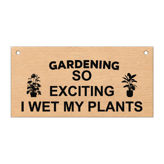 Gardening: I Wet My Plants laser engraved wooden plaque on a white background