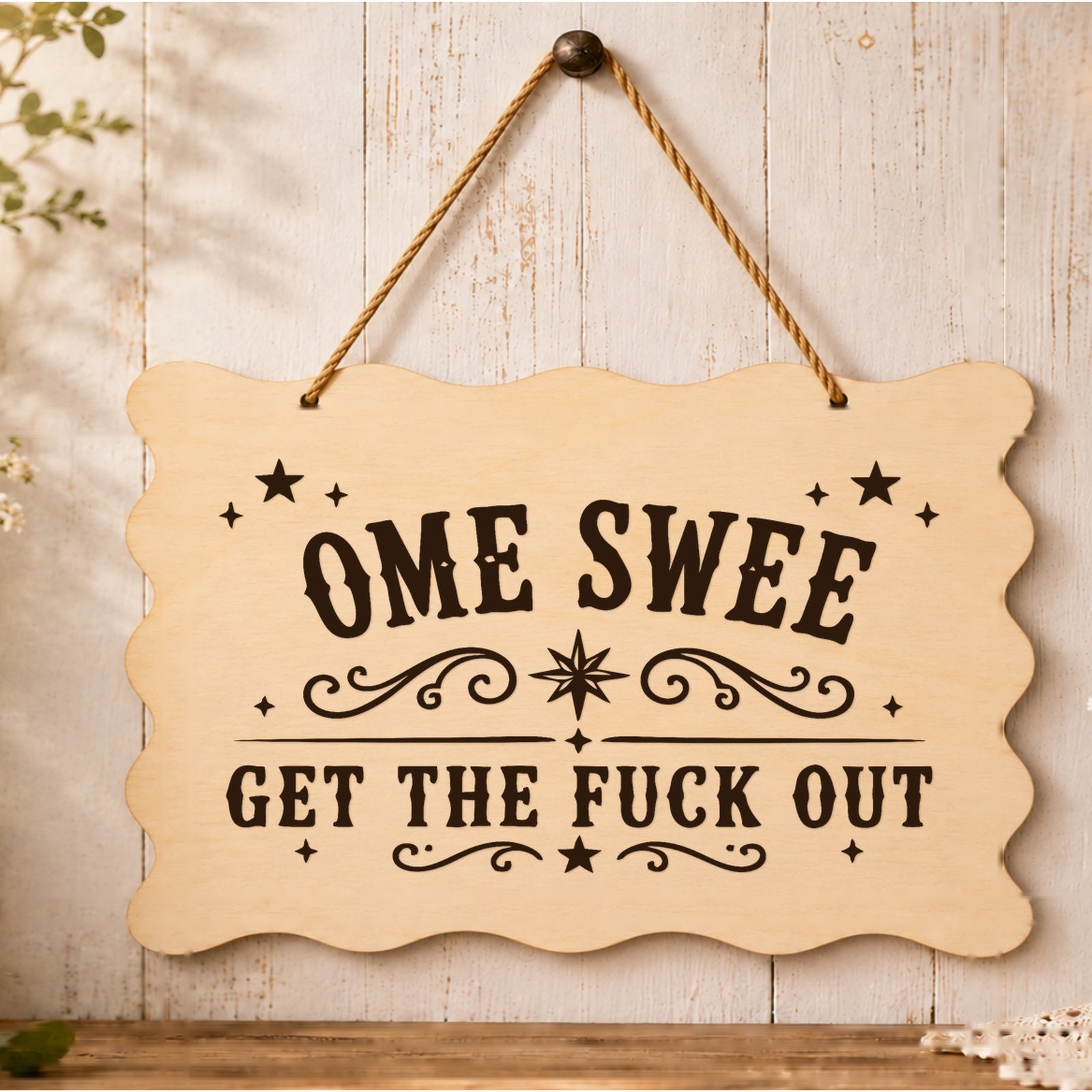 Home Sweet Get the F**k Out plaque displayed in a home setting