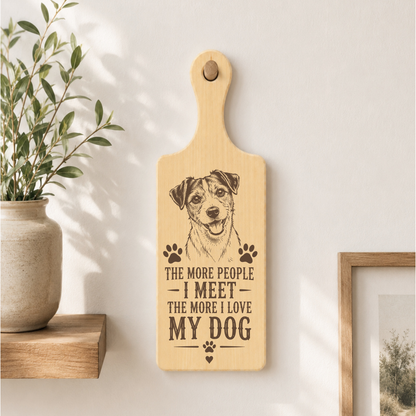 The More People I Meet the More I Love My Dog plaque displayed in a dog-friendly home setting