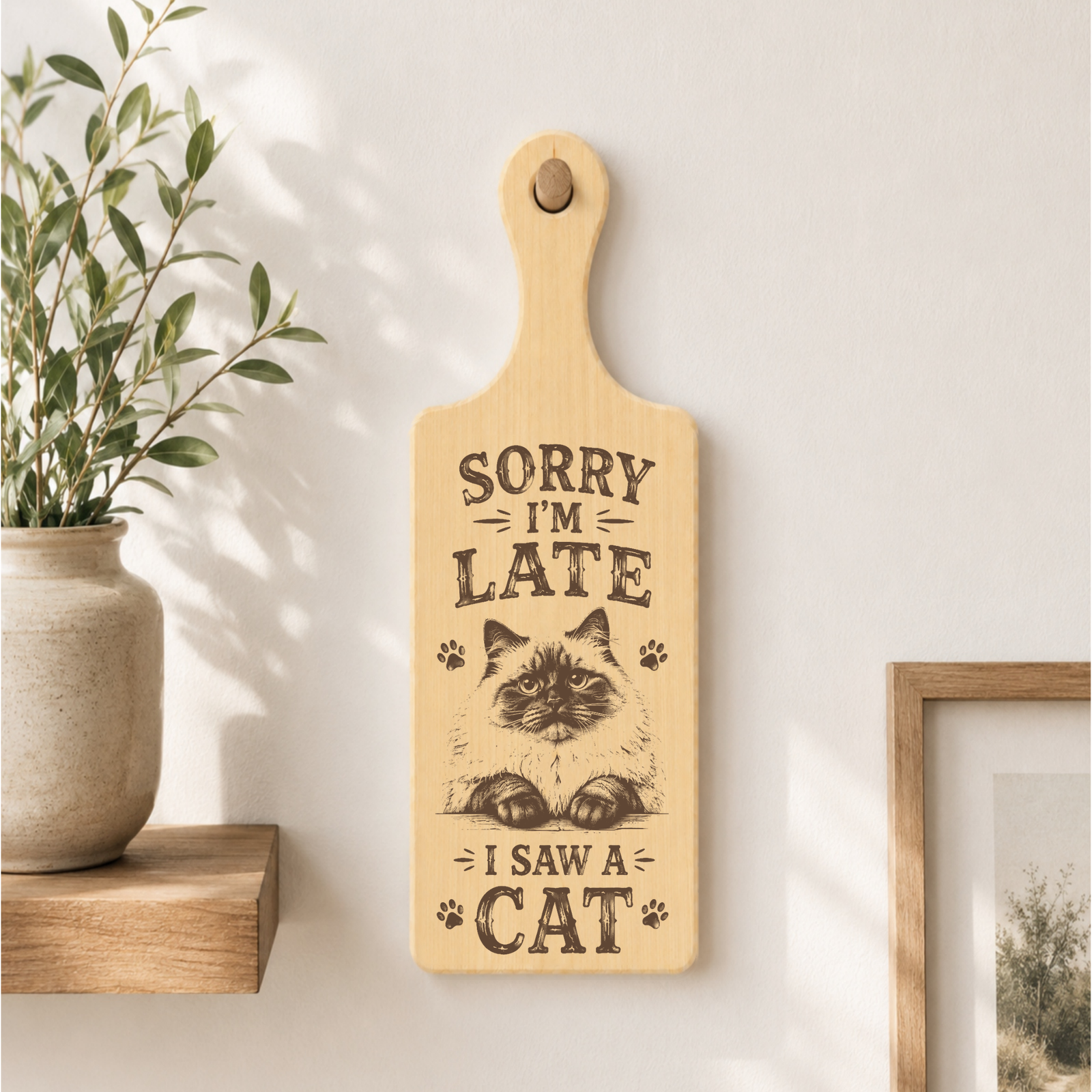 Sorry I’m Late I Saw a Cat plaque displayed in a cat-friendly home setting