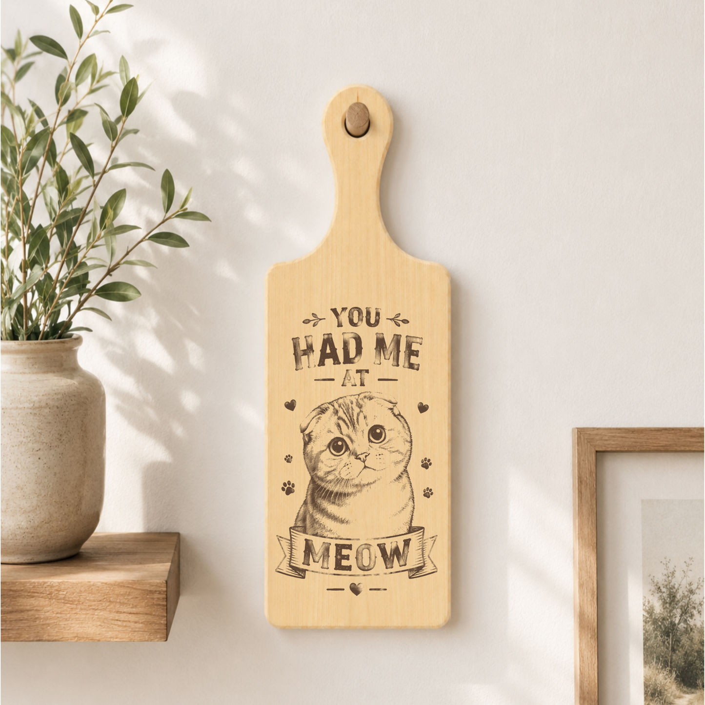 You Had Me at Meow plaque displayed in a cat-friendly home setting
