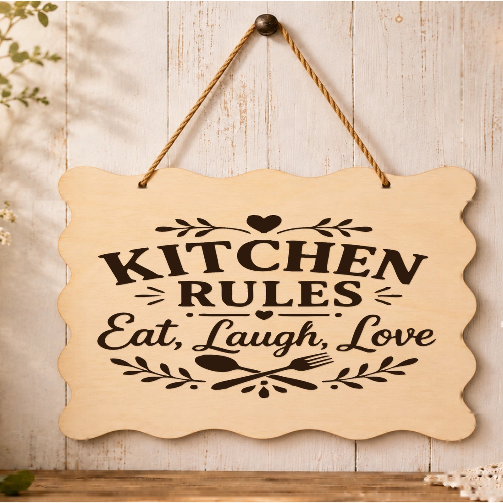 Kitchen Rules Eat Laugh Love plaque displayed in a kitchen setting
