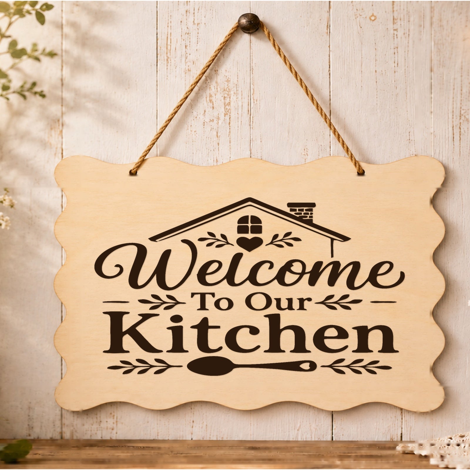 Welcome to Our Kitchen plaque displayed in a kitchen setting