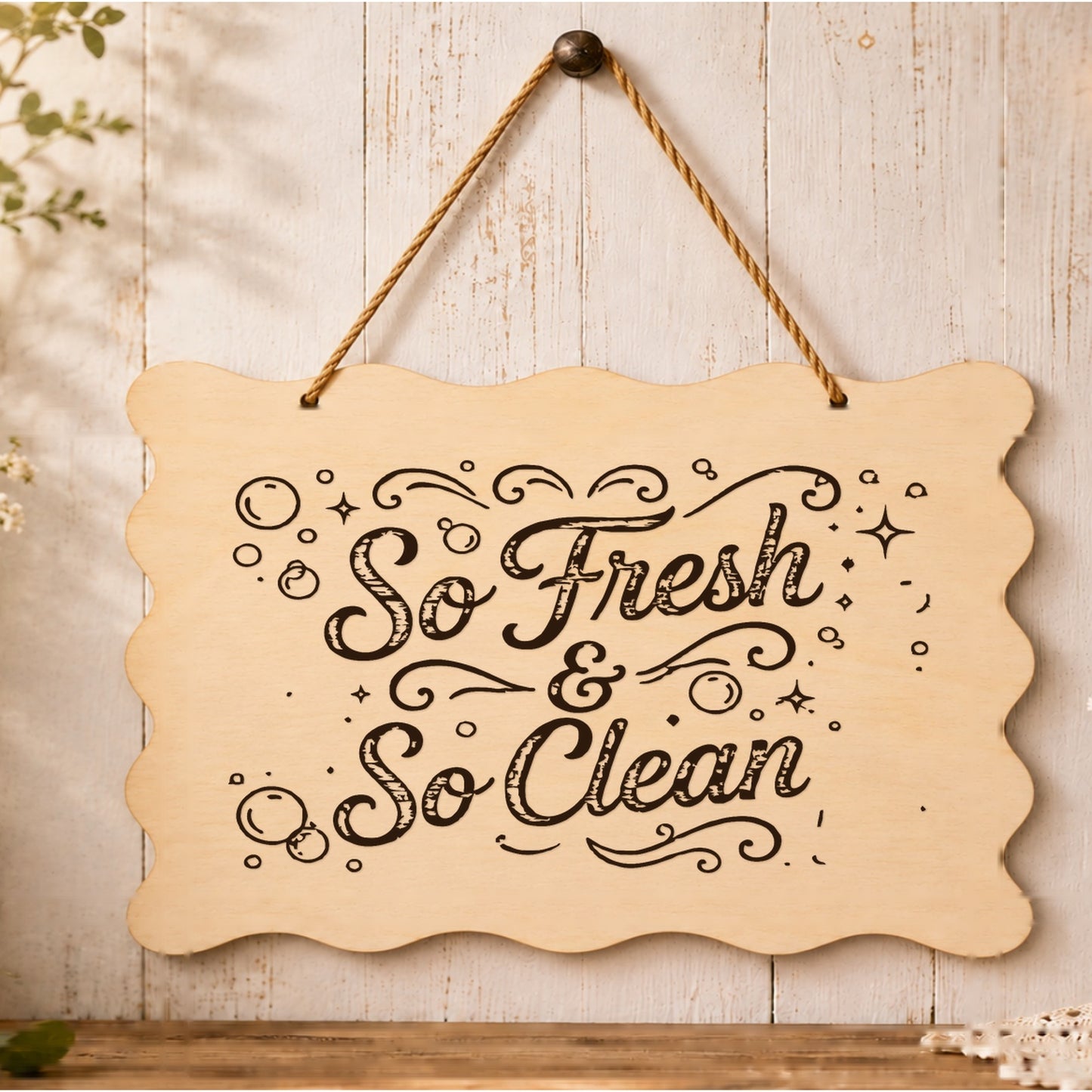 So Fresh and So Clean wooden plaque displayed in a bathroom setting