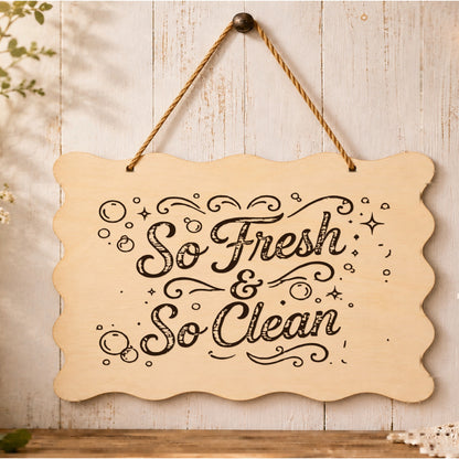 So Fresh and So Clean wooden plaque displayed in a bathroom setting