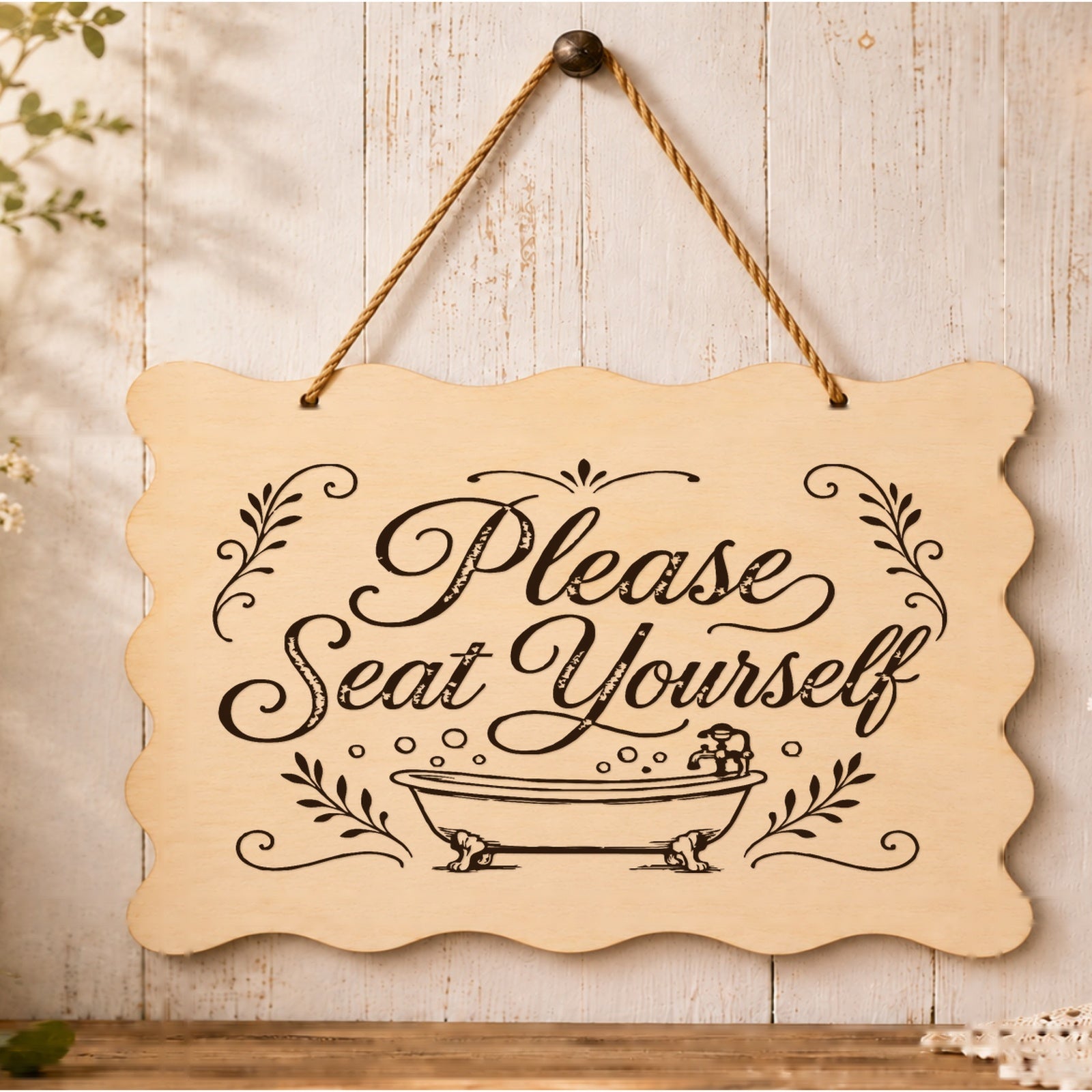 Please Seat Yourself wooden plaque displayed in a bathroom setting