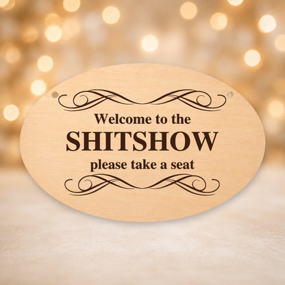944, Welcome to the Shitshow, oval plaque