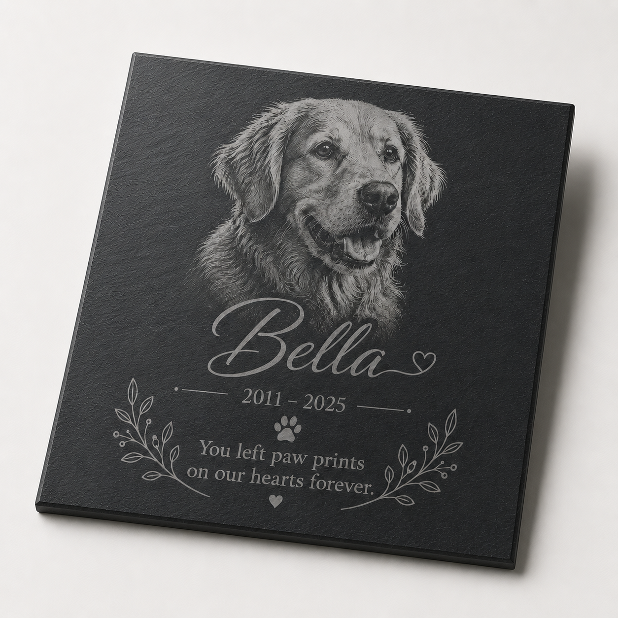 Personalised photo-engraved pet memorial slate displayed as a remembrance tribute