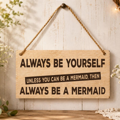 Always Be a Mermaid wooden plaque displayed in a bathroom setting