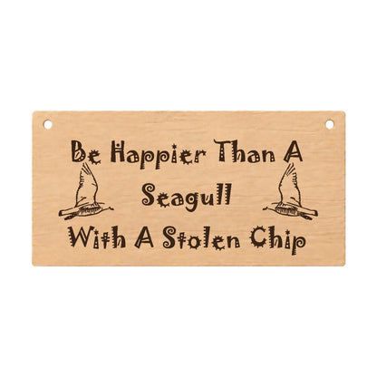 Happier Than a Seagull With a Chip funny wooden plaque on a white background