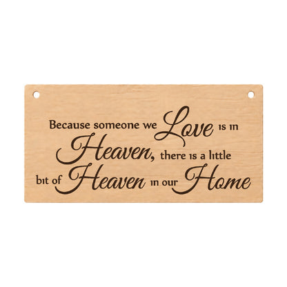 Because Someone We Love Is In Heaven memorial wooden plaque on a white background