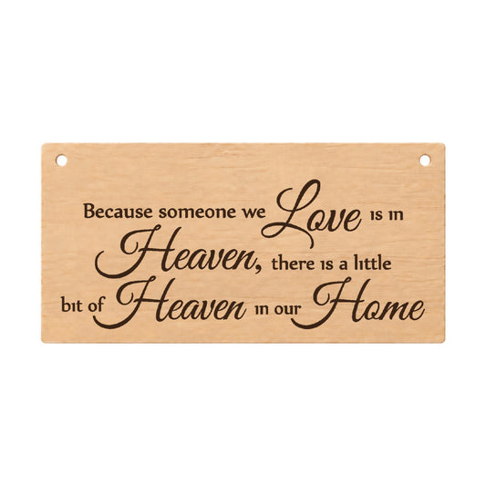 Because Someone We Love Is In Heaven memorial wooden plaque on a white background