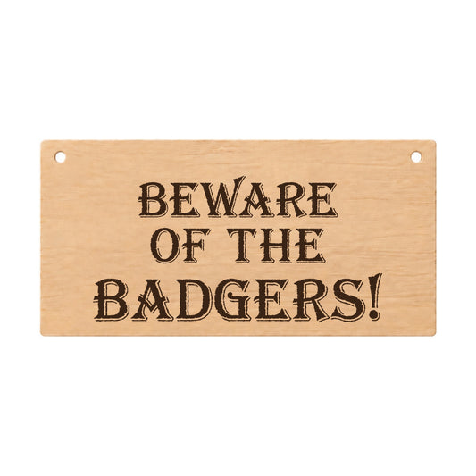 Beware of the Badgers funny wooden garden plaque on a white background