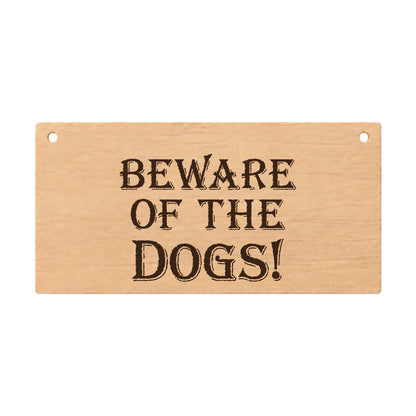 Beware of the Dogs funny laser engraved wooden plaque on a white background