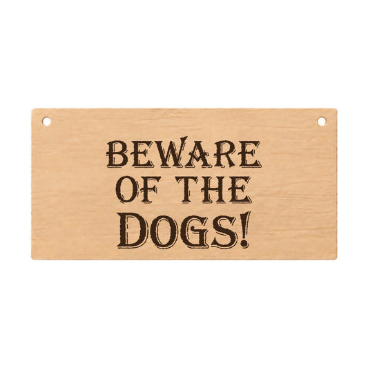 Beware of the Dogs funny laser engraved wooden plaque on a white background