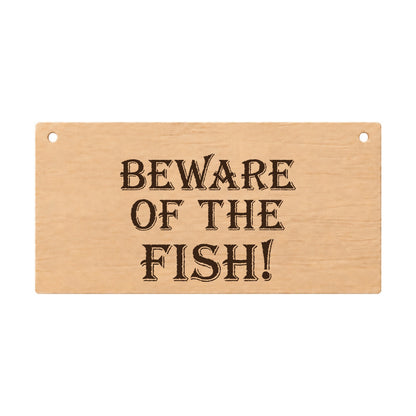 Beware of the Fish funny laser engraved wooden plaque on a white background
