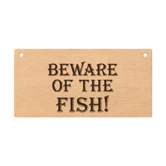 Beware of the Fish funny laser engraved wooden plaque on a white background