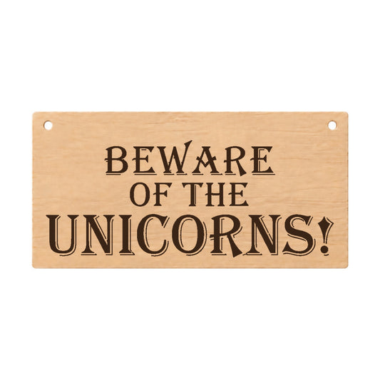 Beware of the Unicorns magical laser engraved wooden plaque on a white background