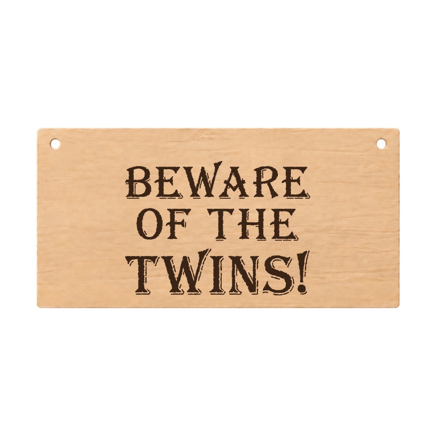 Beware of the Twins funny laser engraved wooden plaque on a white background