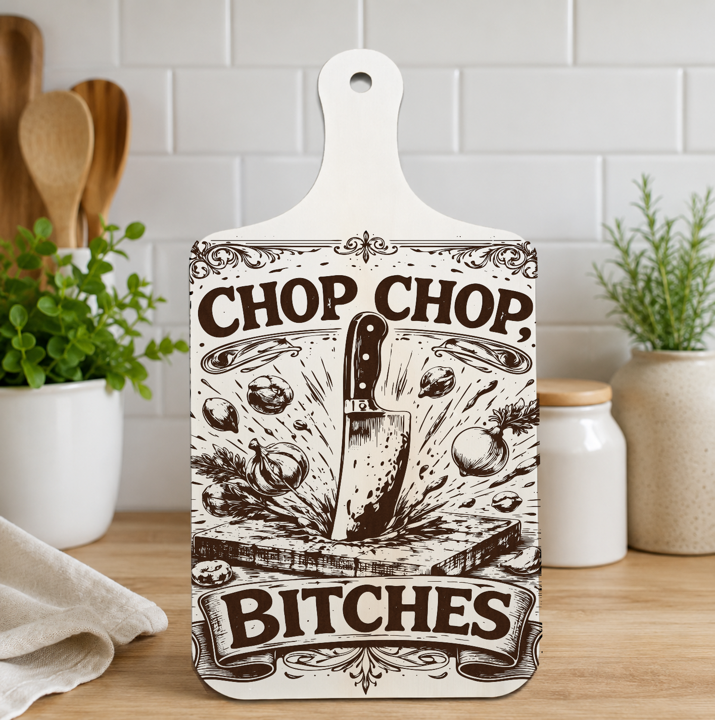 Chop Chop Bitches engraved wooden wall plaque displayed in a kitchen