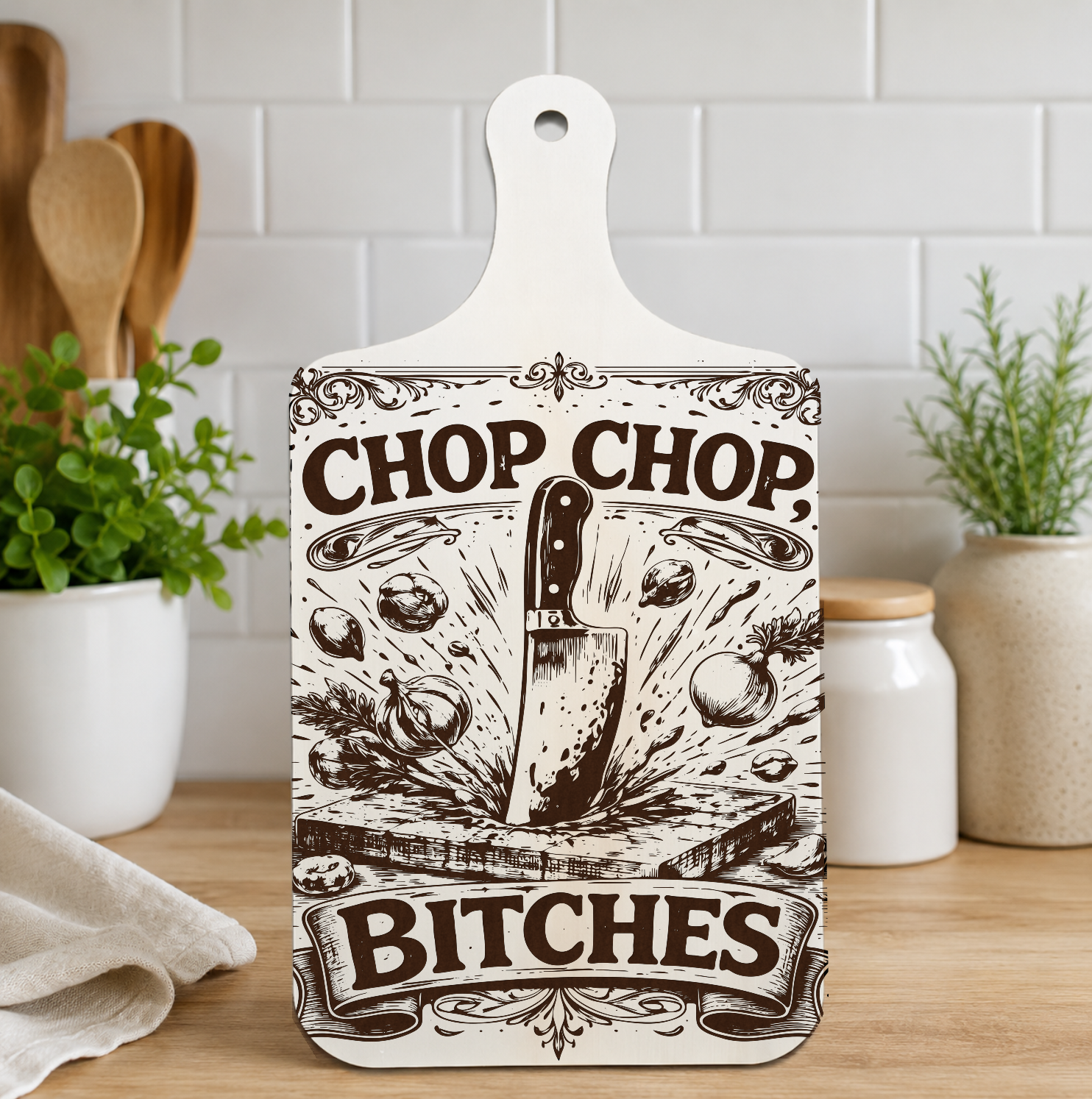 Chop Chop Bitches engraved wooden wall plaque displayed in a kitchen
