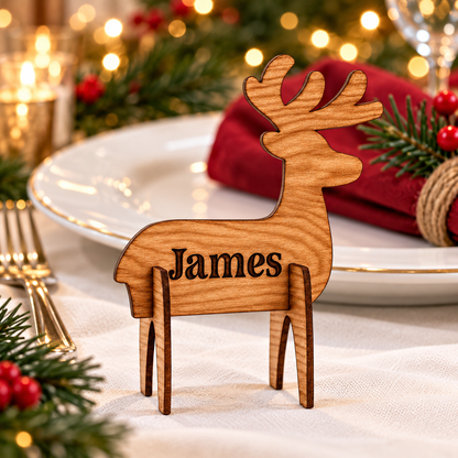Wooden Christmas place name stand - Reindeer design shown at a festive dinner setting