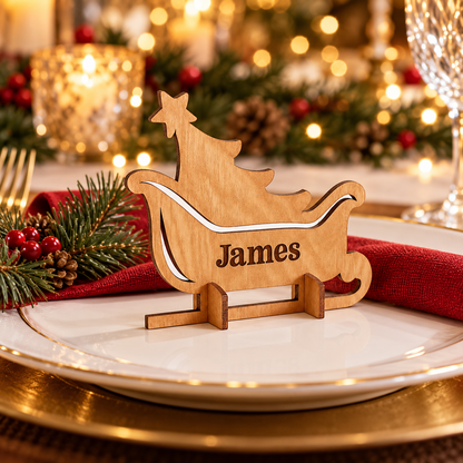 Wooden Christmas place name stand - Sleigh design shown at a festive dinner setting