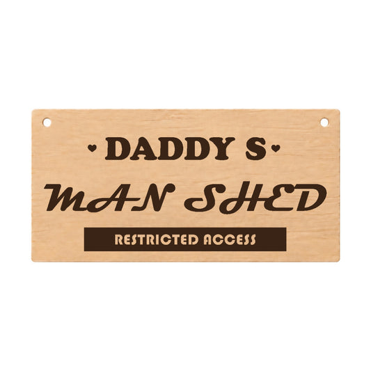 Daddy's Man Shed laser engraved wooden plaque on a white background