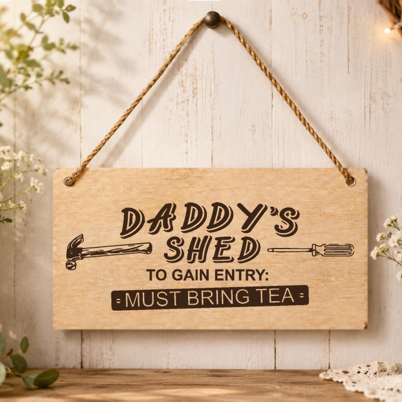 Daddy's Shed wooden plaque displayed in a shed setting