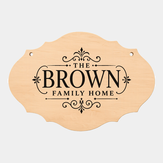 Personalised family name fancy oval plaque style six on a white background
