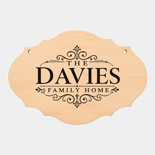 Personalised family name fancy oval plaque style seven on a white background