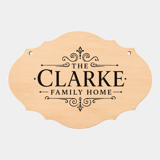 Personalised family name fancy oval plaque style ten on a white background