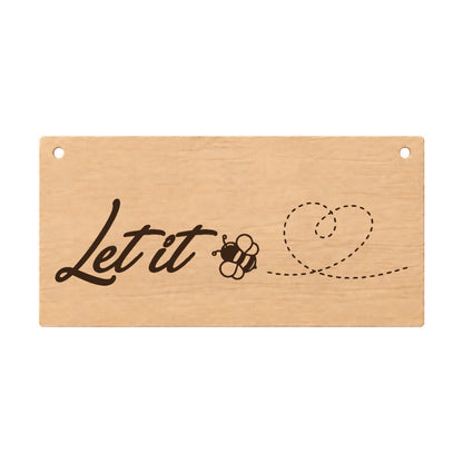 Let It Be Love inspirational wooden plaque on a white background