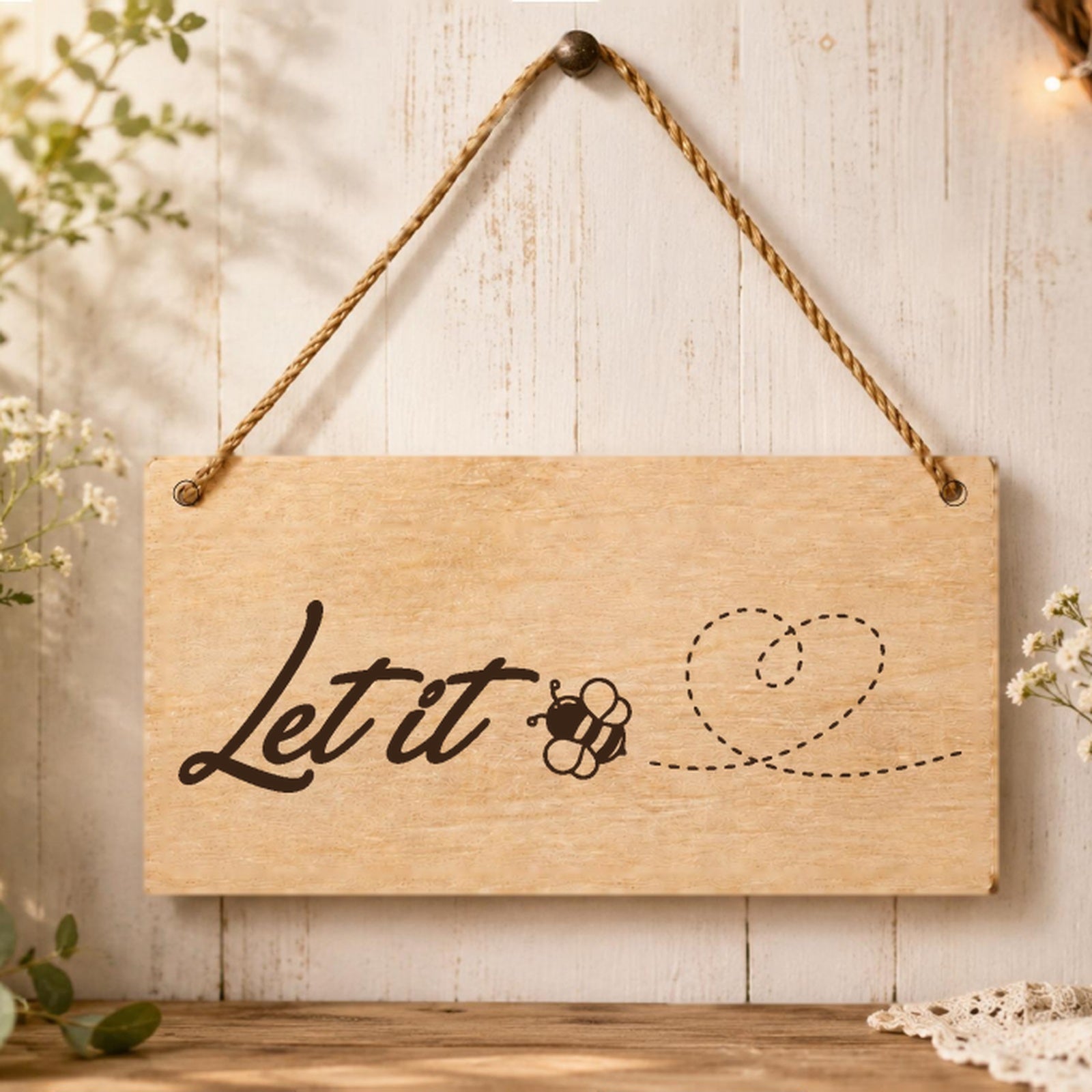 Let It Be Love wooden plaque displayed in a home setting