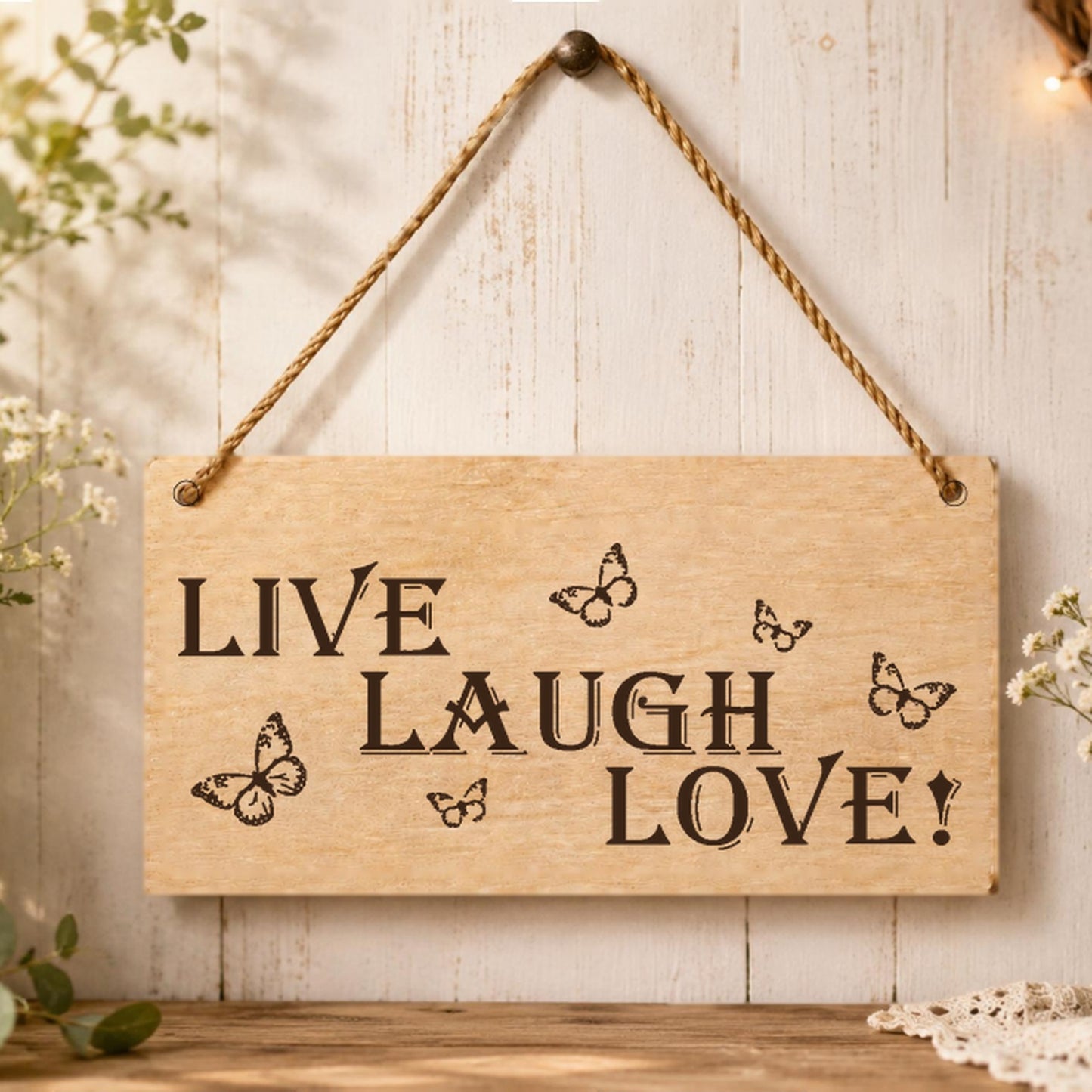 Live Laugh Love wooden plaque displayed in a home setting