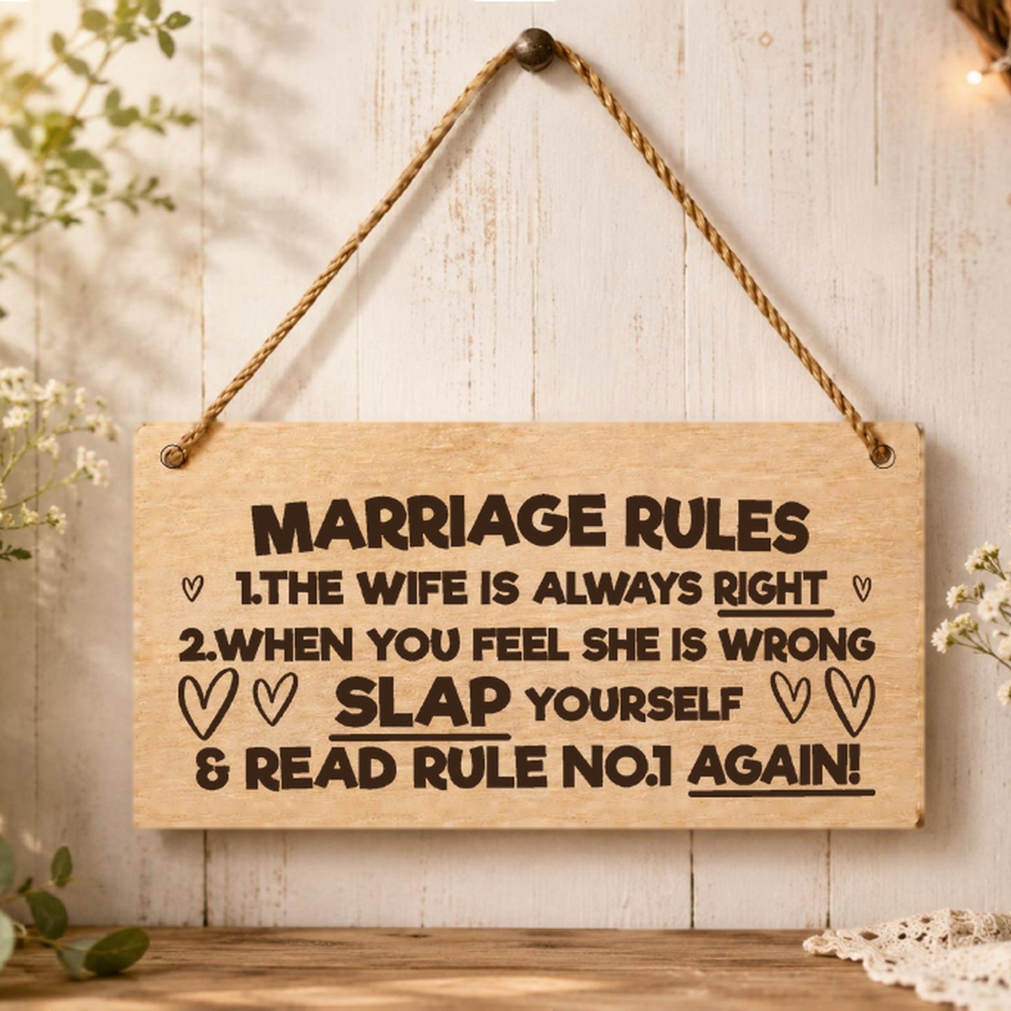 Marriage Rules wooden plaque displayed in a home setting