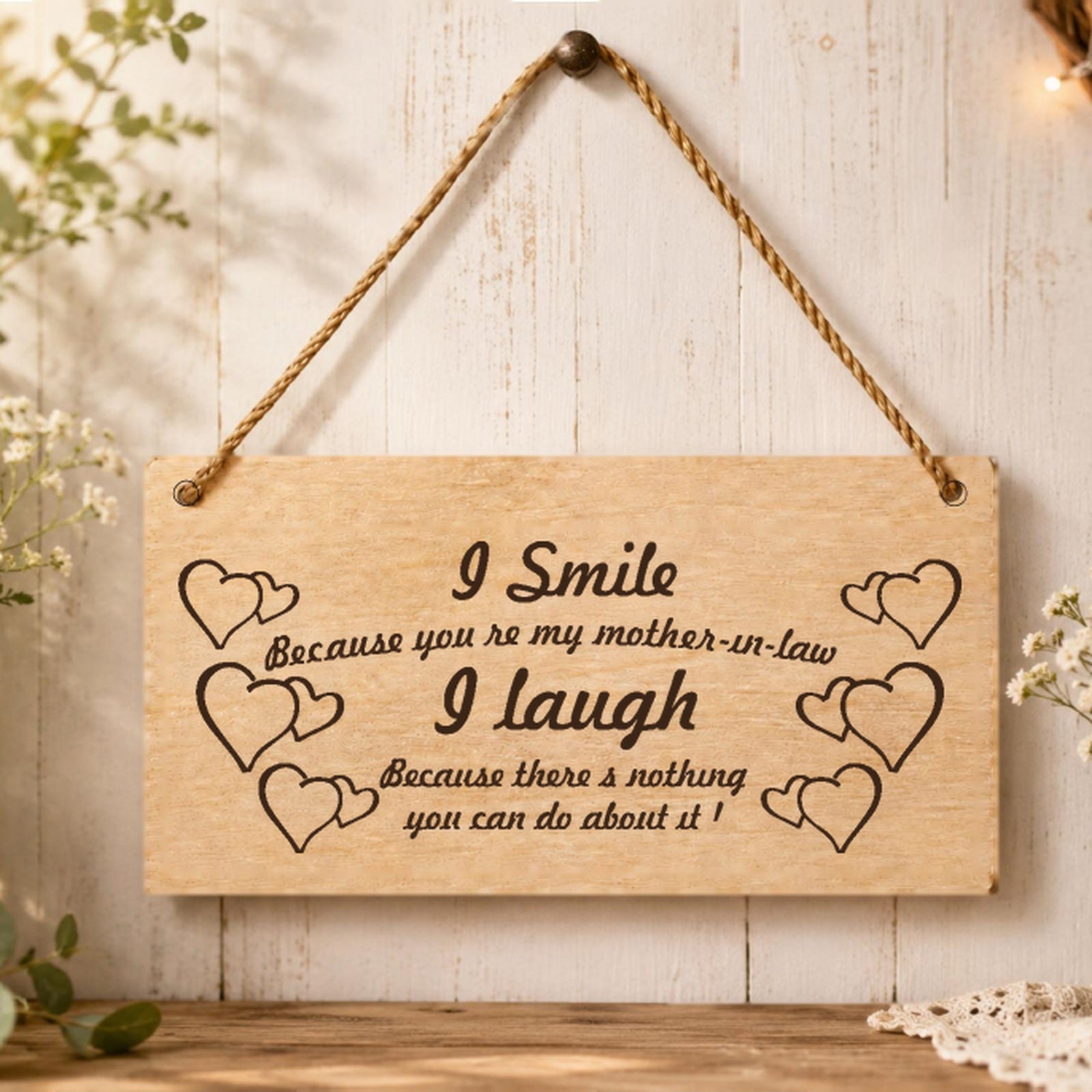 I Smile Because You’re My Mother-in-Law plaque displayed in a home setting