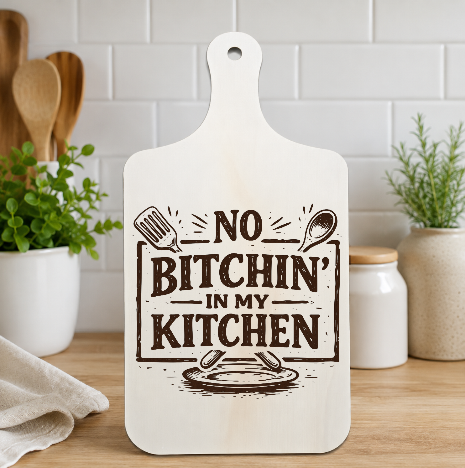 No Bitchin’ in My Kitchen engraved wooden wall plaque displayed in a kitchen