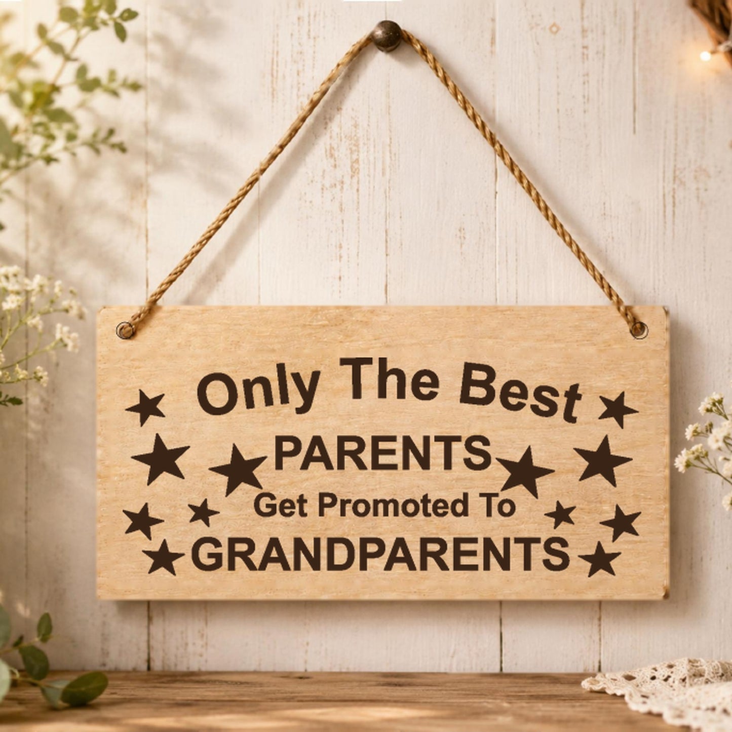 Parents Promoted to Grandparents plaque displayed in a family home setting