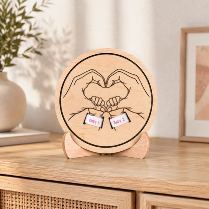 Personalised two babies sibling keepsake plaque displayed on sideboard